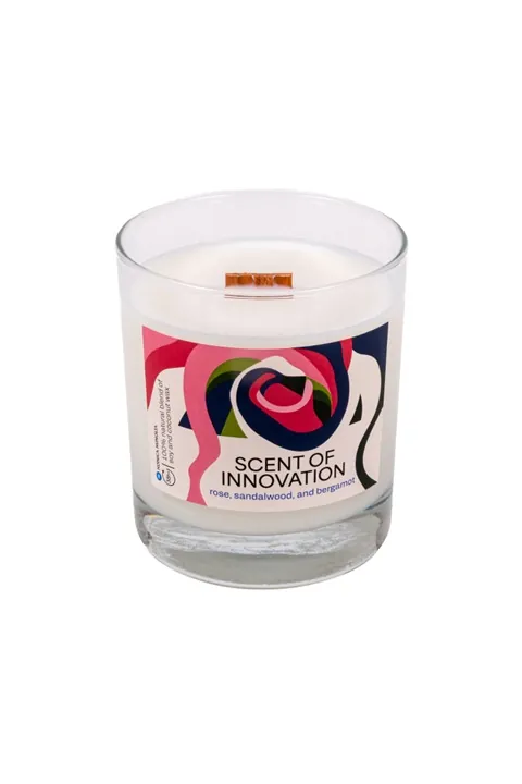 An open natural scented candle in a glass vessel, produced for Konica Minolta as a corporate gift