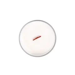 Top view of a natural scented candle in a glass vessel, produced as a corporate gift